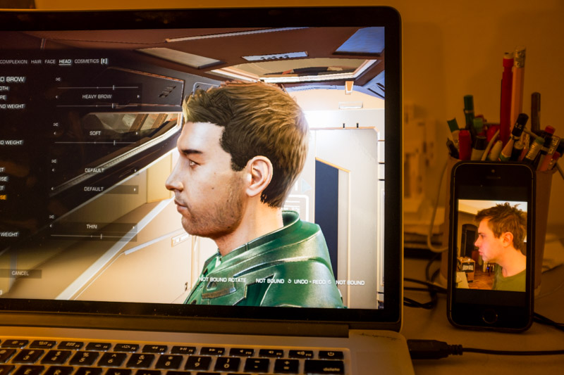 Elite running on a Mac laptop while making my avatar in-game.