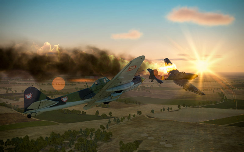 Stuka on fire being pursued by the player’s IL-2 sporting the Combat Air Mail logo.