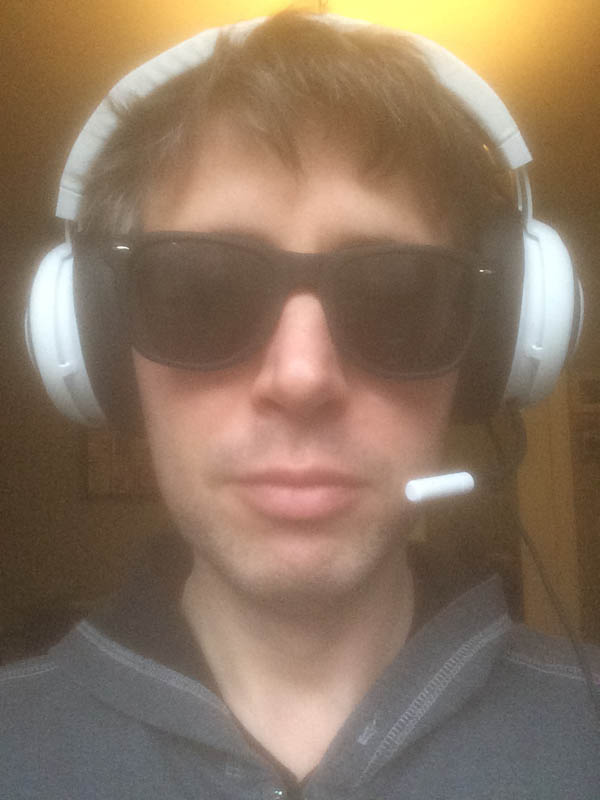 A photo of the author wearing the Razer Kraken headphones.