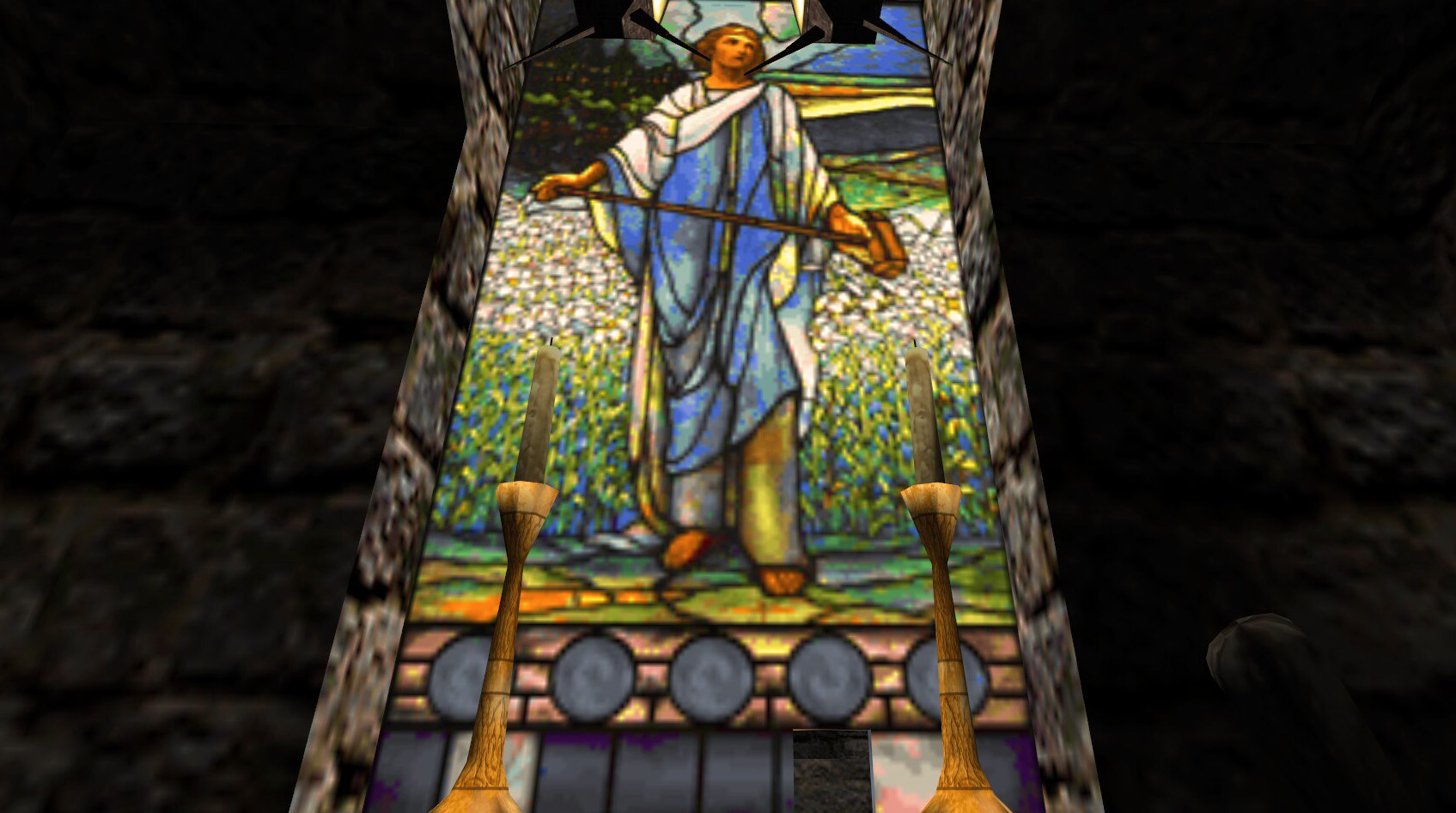 Stained glass window showing a robed figure holding a hammer in both hands.
